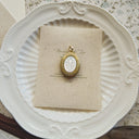 The Fleur Sovereign Locket