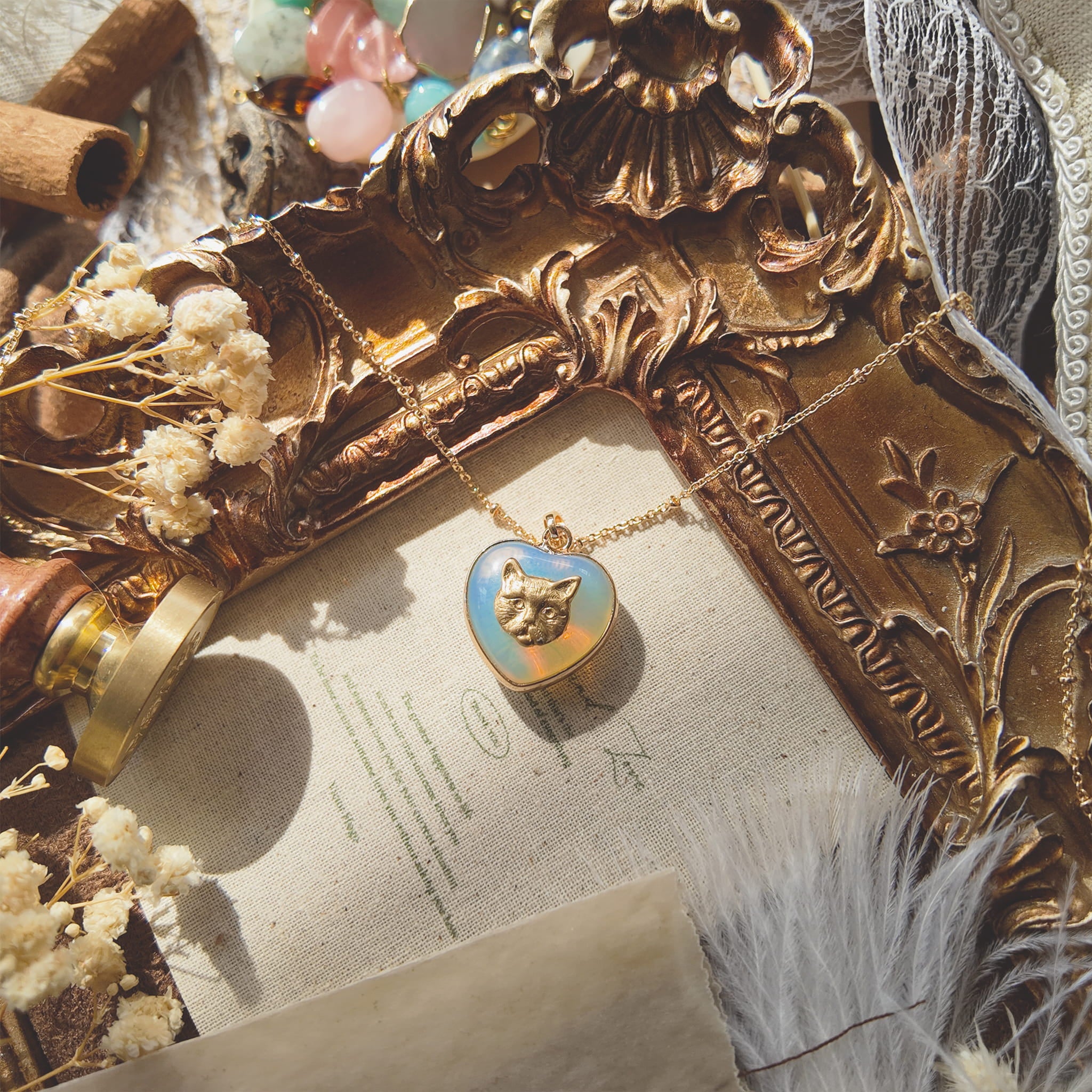 The Opaline Kitten Pendant