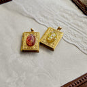 The Gilded Chapter Locket