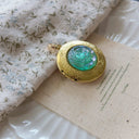 The Emerald Reverie Locket Pendant