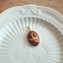 The Crimson Flight Pendant
