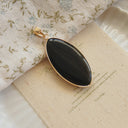 The Noir Poppy Pendant
