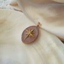 The Rosethorn Compass Pendant