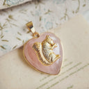 The Glimmering Acorn Heart Pendant