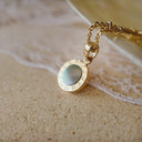 The Aurora Compass Charm