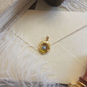 The Golden Seed Pendant