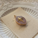 The Rosethorn Compass Pendant