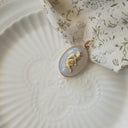 The Cozy Glance Feline Pendant