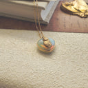 The Opal Mystic Feline Pendant