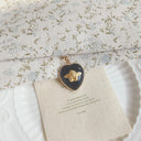 The Cherub's Gaze Heart Pendant