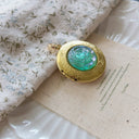 The Emerald Reverie Locket Pendant