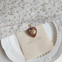 The Ruby Whisker Echo Pendant