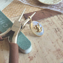 The Glimmering Pond Frog Pendant