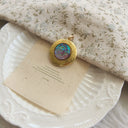 The Aurora Muse Locket Pendant