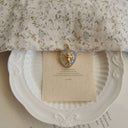 The Tender Aim Pendant