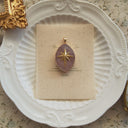 The Rosethorn Compass Pendant