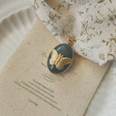 The Verdant Sanctuary Butterfly Pendant