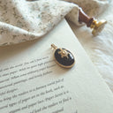 The Cosmic Drifter Turtle Pendant