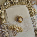 The Amber Whisker Heart Pendant