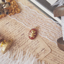 The Crimson Keepsake Teddy Pendant