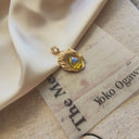 The Golden Seed Pendant