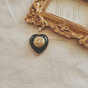 The Sun & Moon Heart Pendant