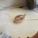 The Rosethorn Compass Pendant