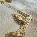 The Gilded Dreamweaver Nutcracker Pendant