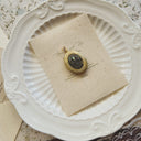 The Fleur Sovereign Locket