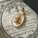 The Sapphire Current Fish Pendant