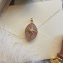 The Rosethorn Compass Pendant