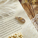 The Glimmering Grin Marquise Pendant