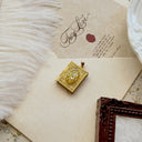 The Gilded Chapter Locket