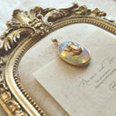 The Glimmering Pond Frog Pendant