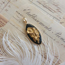 The Noir Poppy Pendant