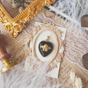 The Cherub's Gaze Heart Pendant