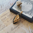 The Noir Poppy Pendant