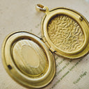 The Fleur Sovereign Locket