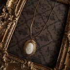 Cameo pendant necklace, gold-rimmed, carved white stone. A timeless classic, elegant vintage jewelry, a must-have for vintage collectors.