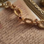 Showcasing details of the red gemstone