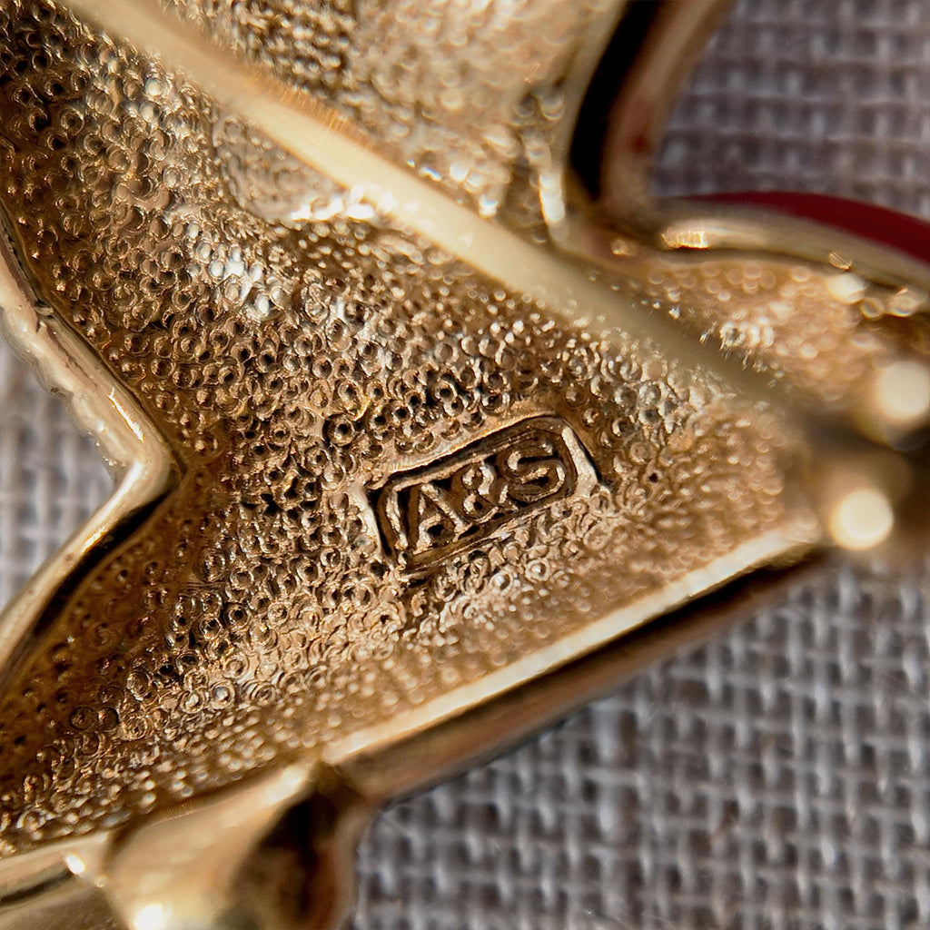 A close-up of the A&S brand stamp, which is an abbreviation for Attwood Sawyer Brooch.