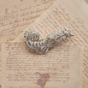 "The Gilded Plume Grandeur" Brooch