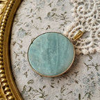 Amazonite disc pendant, a light blue natural stone with natural white veins. Genuine stone, beautiful blue, a favorite among blue enthusiasts.