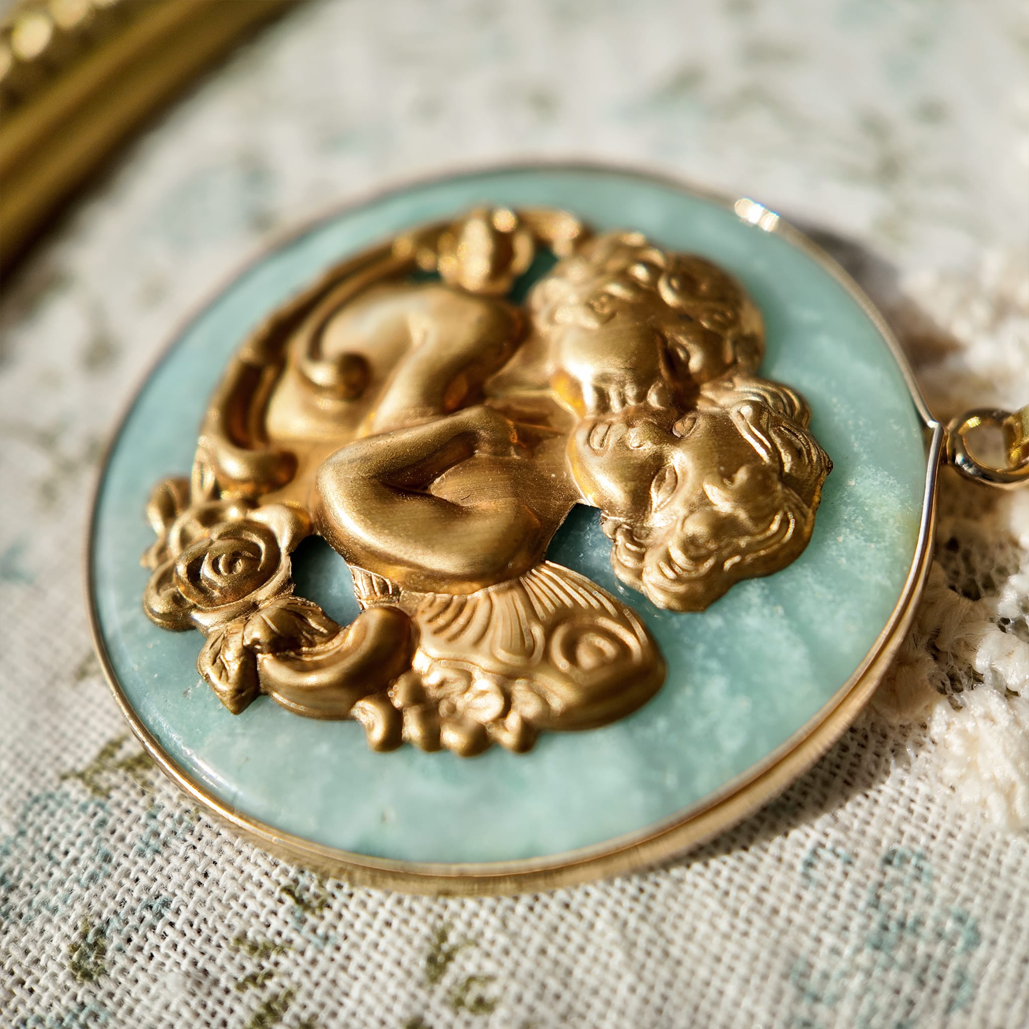 Angel jewelry, vintage-style jewelry with figurative designs. Angel pendant, blue angel.