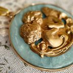 Vintage pendant, angel design, a holy angel. A pendant representing children. Cute and devout.
