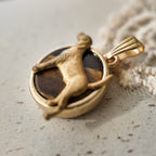 Dog jewelry, lucky charm. Labrador-themed items, brass puppy pendant. Cute and vintage style.