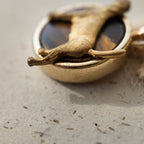 Tiger's eye metal pendant, a natural golden-brown stone pendant, featuring a dog design. A talisman for dog lovers.