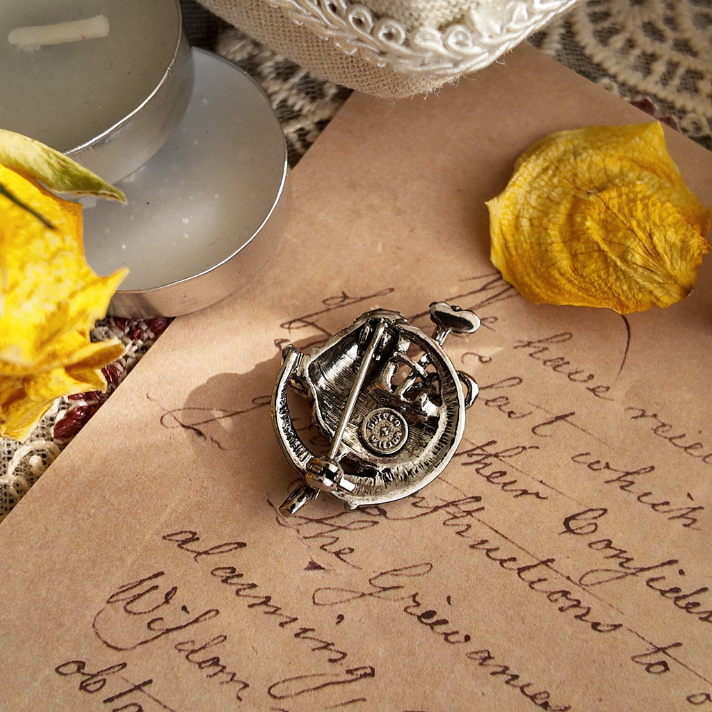 The back of the polo brooch bears the Butler & Wilson brand stamp, confirming the provenance of this vintage polo brooch.