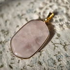 Rose quartz pendant with metal bezel; a must-have for crystal lovers. Rose quartz amulet.