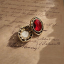 Red vintage jewelry, fine jewelry from the 1900s to 1940s.